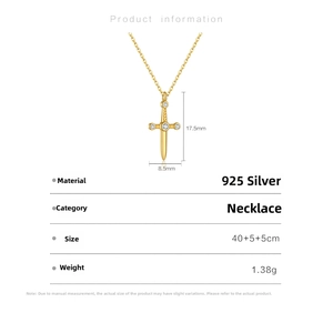 Detail view of gold S925 silver arrow pendant with size measurements 17.5mm by 8.5mm
