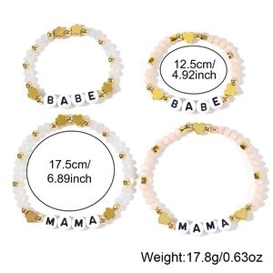 Detail of beaded MAMA and BABE bracelets with gold stars and measurements shown