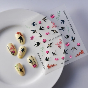 Detailed 5D embossed nail stickers featuring spring swallows and peach blossom patterns