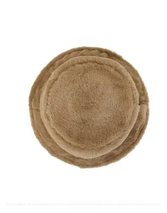 Top view of a thick plush bucket hat for women in camel faux fur with soft fuzzy texture
