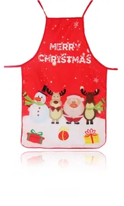 Detail of red Christmas apron with Merry Christmas lettering and festive cartoon print