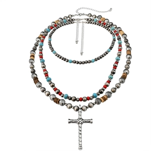 Three-layer turquoise and wood bead necklace with a textured silver cross pendant