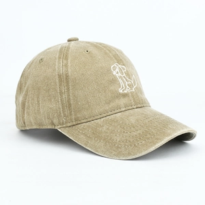 Close-up of khaki washed cotton baseball cap featuring minimalist puppy embroidery