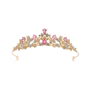 Close-up of golden crown with pink crystal droplets and shimmering zircon details