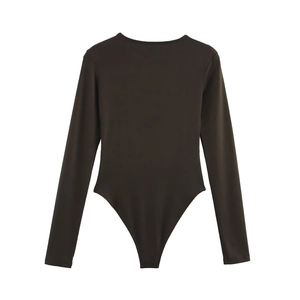 Close-up of deep brown long sleeve bodysuit featuring high cut leg and smooth texture