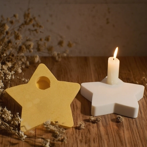Star-shaped resin candle holder mold set with matte finish and minimalist star design