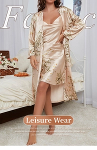 Detail of silk-satin two-piece pajama set with delicate floral prints and lace trim