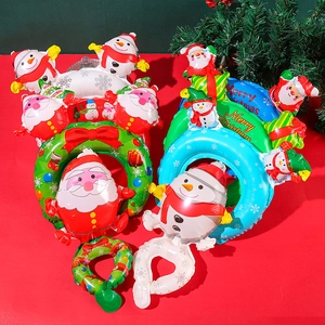 Christmas wrist foil balloons set featuring Santa Claus, Snowman and reindeer shapes