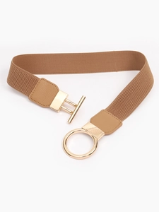 Detail of camel elastic waist belt with gold interlocking metal ring buckle on white base