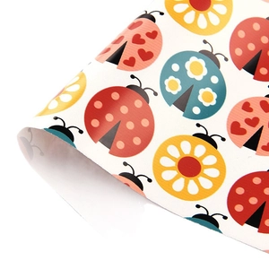 Litchi texture faux leather fabric with colorful ladybug print for DIY crafts and gifts