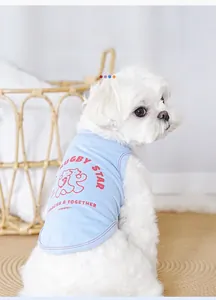 Close-up of a blue breathable cotton dog vest featuring Rugby Star printed graphics