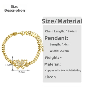 Macro shot of 18K gold plated butterfly charm bracelet with white cubic zirconia inlay