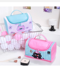 Detail of sweet cartoon cat makeup bags with top handles and dual zipper closure