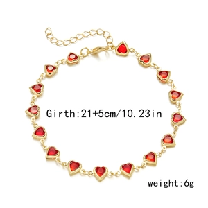 Detailed view of red heart crystal bracelet with adjustable gold chain and specifications