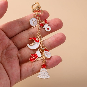 Christmas alphabet Y keychain with reindeer, Santa, and tree charms on gold chain