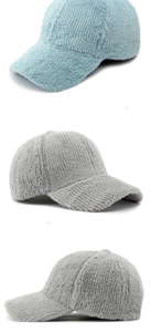 Detail of light blue and grey plush baseball caps with vertical striped fuzzy texture