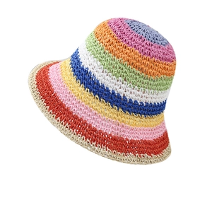 Handwoven rainbow striped straw bucket hat for women providing elegant sun protection