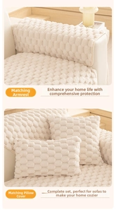 Detail of cream plush sofa armrest cover and pillow cases with waffle grid texture