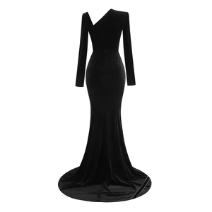 Detail of black velvet mermaid dress showing the back view and long sleeves design