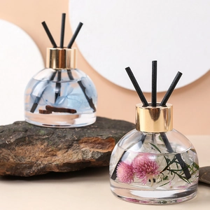 Preserved flower car aroma diffuser in glass bottle with black reeds for fresh scent