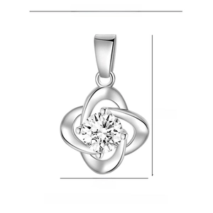 Silver four-leaf clover pendant with large cubic zirconia and dimensions marking