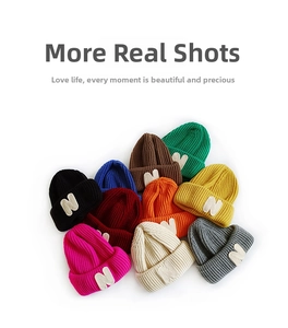 Detailed color palette of ribbed knit beanies with N patches in multiple vibrant shades