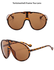 Detailed views of tortoise shell oversized shield sunglasses with tinted tea lenses