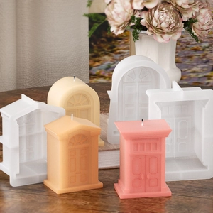 Macro detail of silicone candle molds showing intricate Roman palace and archway textures