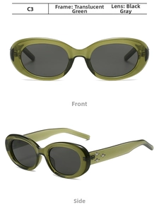 Detail of vintage oval green frame sunglasses with star accents in C3 color