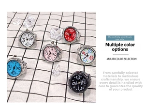 Detailed view of elastic metal ring watches in six colors on a checkered backdrop