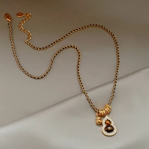 18K gold-plated double hulu pendant necklace with black cord and tiger eye stone