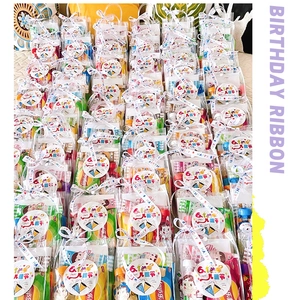 Bulk Children's Day snack packs with Happy Birthday ribbon and assorted treats