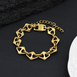 Detail of 18K gold-plated stainless steel bracelet with geometric heart-shaped links