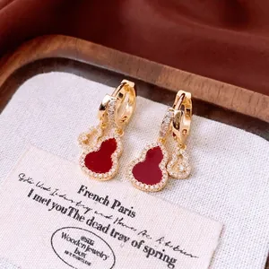 14K gold plated hoop earrings with red hollow gourd pendant and sparkling zircon accents