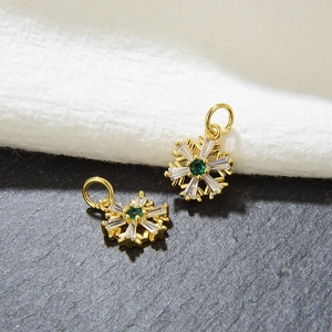 Golden snowflake pendants with green and white zircons for DIY jewelry making
