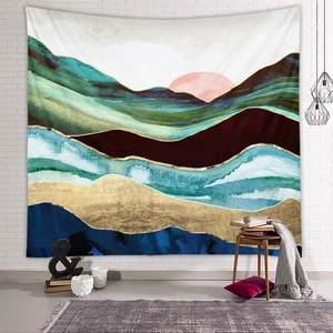 Detail of mountain tapestry with abstract landscape design and modern gold accents