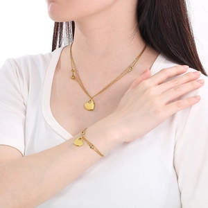 Elegant 18K gold plated stainless steel layered heart necklace and bracelet set for women