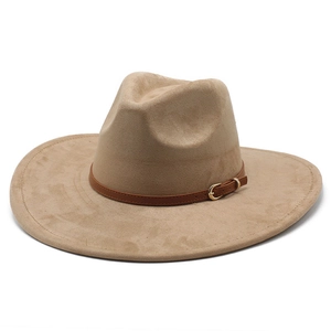 Detail of suede fedora hat featuring a brown leather band and gold metal buckle