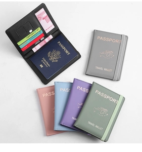 Multi-color PU leather passport covers showing internal card slots and elastic strap