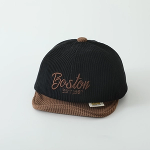 Close-up of Boston embroidery on corduroy kids baseball cap with contrast brim