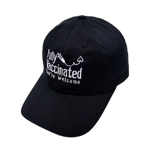 Detail of white Fully Vaccinated embroidery and syringe graphic on black cotton baseball cap