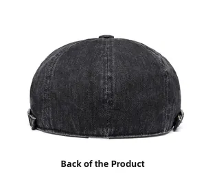 Detail of black washed denim docker hat back view with adjustable metal buckles