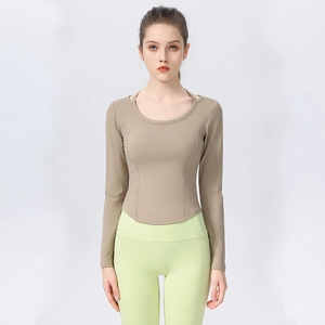 Slim fit long sleeve yoga top with high waist leggings in earth tones and sage green