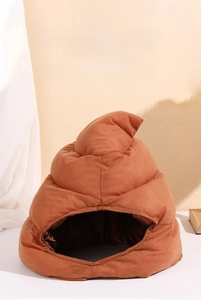 Detailed view of brown plush funny poop hat with 3D spiral shape for Halloween costume