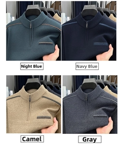Detail view of half-zip knit sweaters in night blue, navy, camel, and grey colors