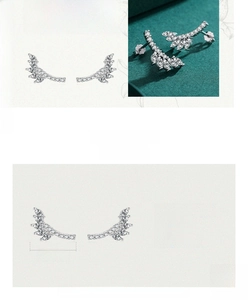 Detailed view of silver wing stud earrings with cubic zirconia and exact dimensions