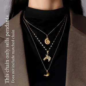 Vintage 18K gold plated titanium steel animal pendants set featuring sea shell and horse head