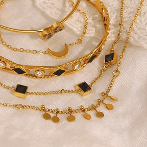 Ensemble de bracelets empilables en acier doré avec pendentifs lune papillon et croix
