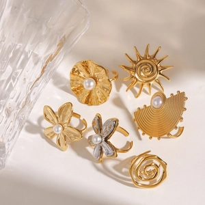 Exaggerated floral 18K gold plated stainless steel rings set with white pearls