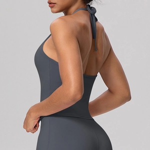 Detail of dark grey halter sports bra showing back straps and high-elastic fabric